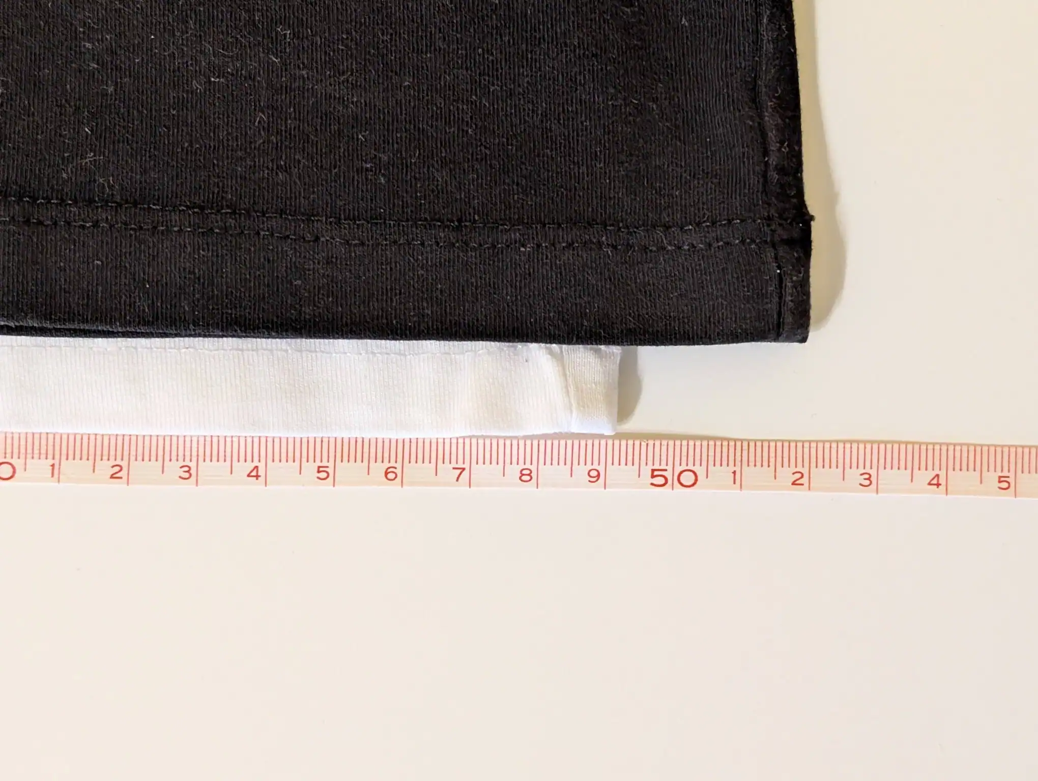 Huel T-Shirt (black) vs SF121 (white) width comparison (in cm), after washing